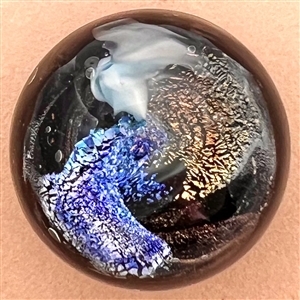 Studio glass paperweight button with dichroic glass by Delilah Davis.