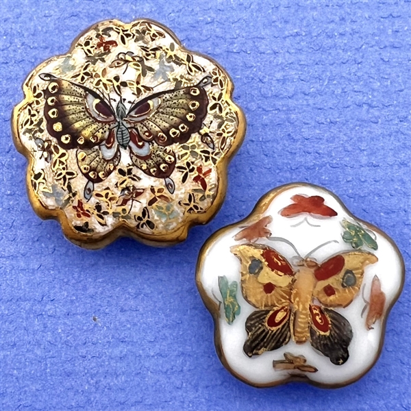 Two Japanese buttons of butterflies.