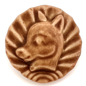 Ceramic button of a young donkeys head.