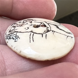 Naughty button of two women interacting.
