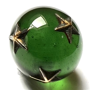 RARE green glass ball button with impression inlay metal stars.