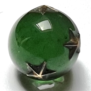 RARE green glass ball button with impression inlay metal stars.