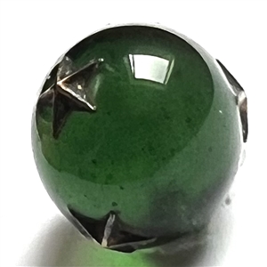 RARE green glass ball button with impression inlay metal stars.