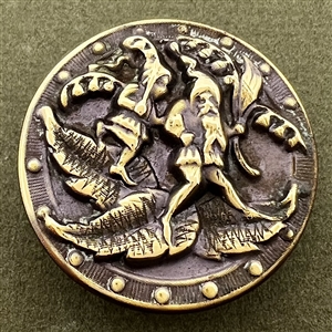 Brass button of gnomes carrying lilies of the valley and walking on leaves.