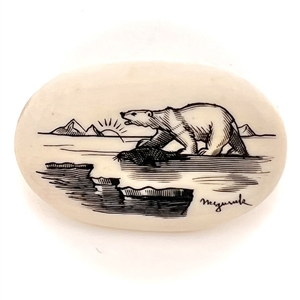 Scrimshaw button of an polar bear on ice.