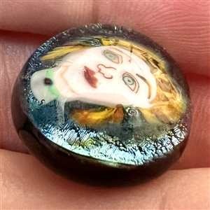 Fabulous Murrine glass studio paperweight button of a woman's face.