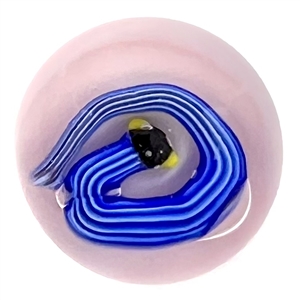 Studio glass paperweight button of a snake.