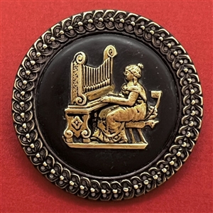 SCARCE brass button of St. Cecilia at the organ.