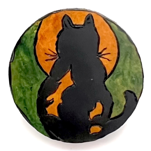 Wood show favor studio button from WSBS 2012 of cat sitting in front of the moon.