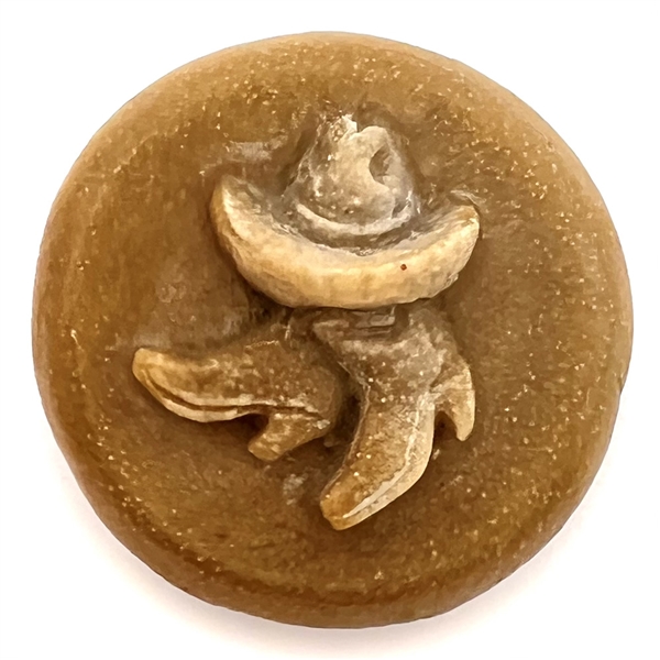 Acrylic shot button of cowboy boots and hat.