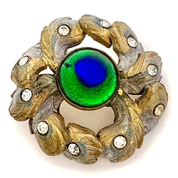 Stunning peacock eye button with border of peacock feathers and pastes.