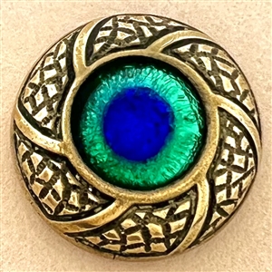 Paris back glass peacock eye button set in brass.