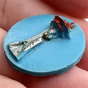 Plastic button of the Space Needle from the 1962 World's Fair in Seattle.