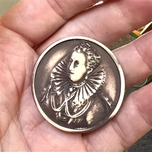 Vintage casein button of Mary Queen of Scots (?).