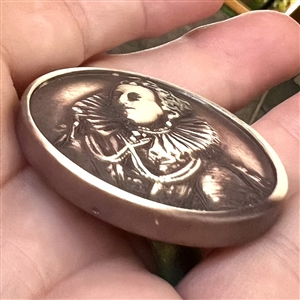 Vintage casein button of Mary Queen of Scots (?).