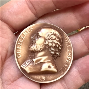 Vintage casein button of Shakespeare with verbal.