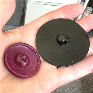 Two Vintage celluloid buttons. 