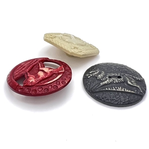 Three buffed Vintage celluloid buttons. 