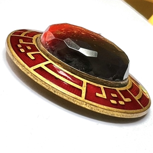Ombre black/red faceted glass in metal with enamel border.
