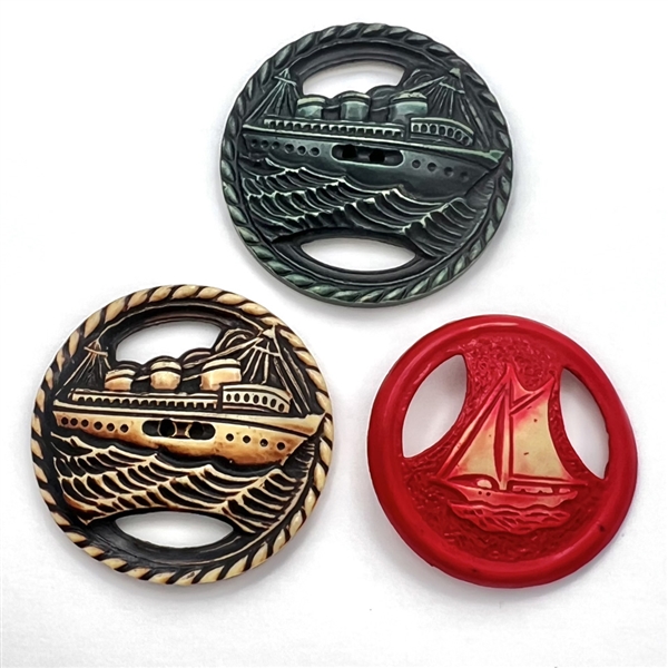 Three buffed Vintage celluloid buttons of ships.