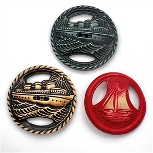 Three buffed Vintage celluloid buttons of ships.