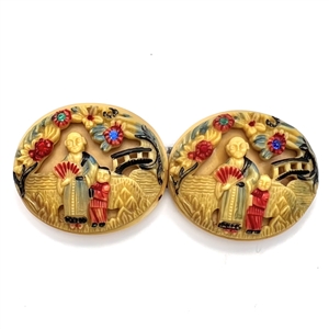 Vintage celluloid two piece buckle of Asian theme.