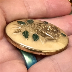 Caramel glass button of a rose.