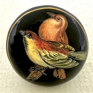 Russian lacquer button of two birds.