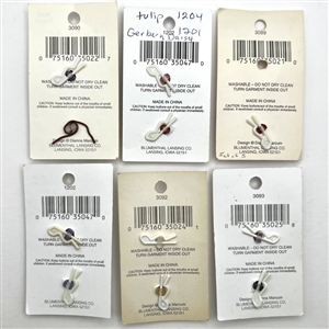 Six La Mode button cards of of flowers.