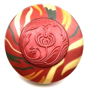 Huge Vintage celluloid tight top button with a celluloid center of a stylized flower.