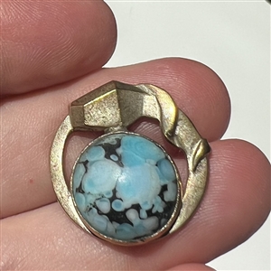 Art Deco snake button of silvered brass with glass.