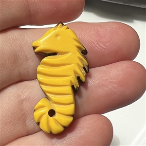 HARD TO FIND laminated Vintage Bakelite laminated over wood button of realistic seahorse.