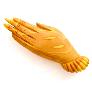 Vintage Bakelite button of realistic left hand.