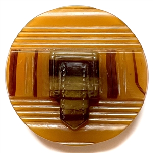 Horn (?) button of a belt and buckle.