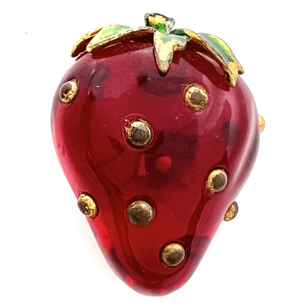 Realistic strawberry with metal stem.