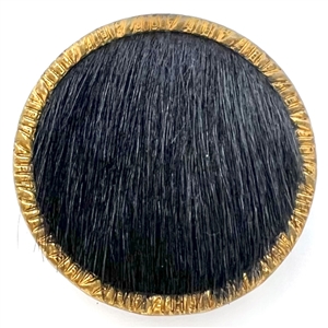 Animal fur with brass rim and tin back button.