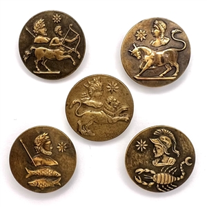 Set of five brass astrology buttons.