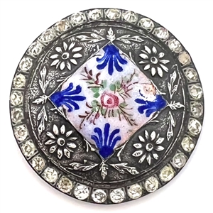 White metal button with flowers, enamel plaquette and paste border.