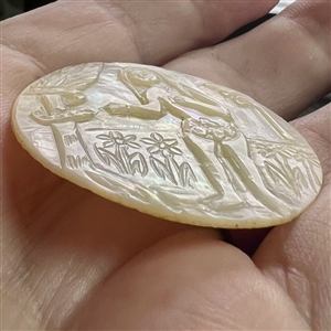 Bethlehem pearl button of Eve and serpent.
