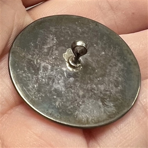 Motiwala enamel button of Jesus holding a lamb.