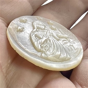Bethlehem pearl button of Jesus performing a miracle.