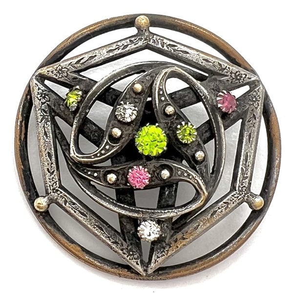 Jeweled button set in silvered brass, possibly from the suffragette movement.