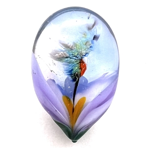 Mary Gaumond's hummingbird drinking from flower glass studio button.