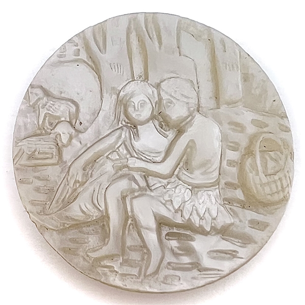 Bethlehem pearl button of man and woman in garden with sheep and a basket.