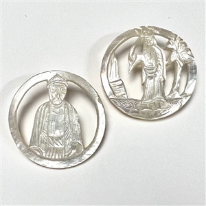 Two Bethlehem pearl buttons with open work of people.