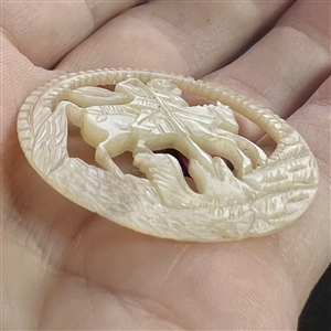 Bethlehem pearl button of St. George slaying the dragon.