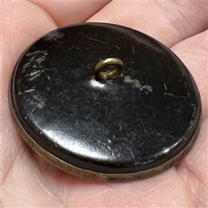 Metal button (pewter?) of “Moses in the bulrushes story from the Book of Exodus. 