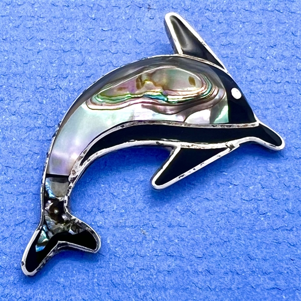 Mother-of-pearl and abalone Mexican inlay button of a dolphin.