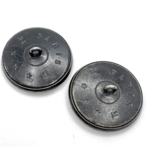 Two Fops buttons with leather backgrounds and cut-steel rims of Incroyable and Merveilleuse.