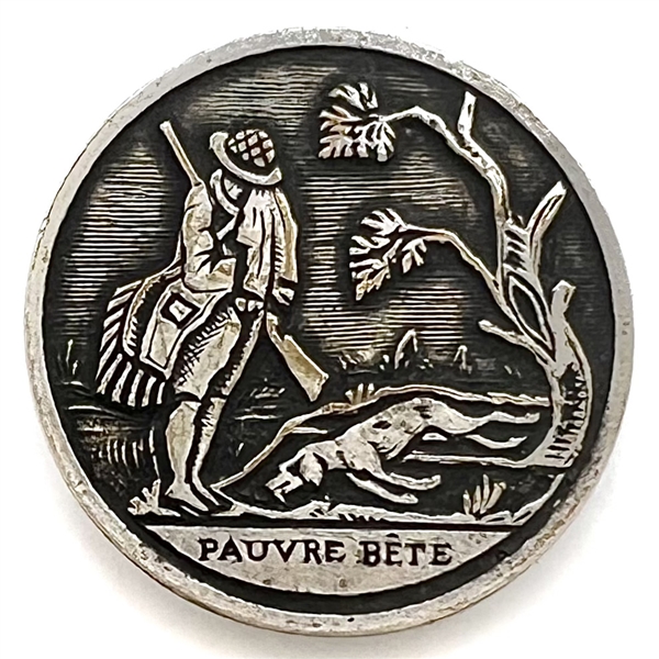 French satyrical sporting button with verbal “Pauvre Bete" (poor beast).
